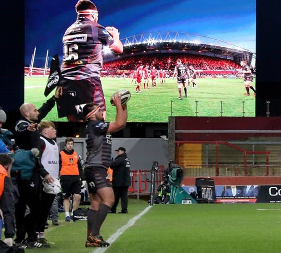 Image of rugby match on large LED Screen